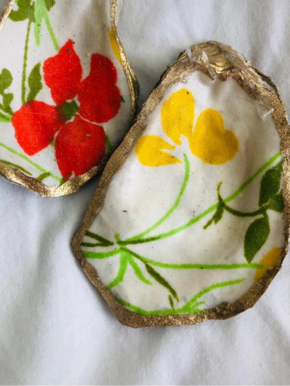 Decoupaged oyster shells